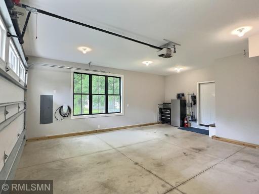 Heated (in-floor hot water) and insulated, the attached garage even has a window and custom built-in bench.