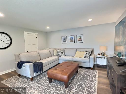 Bright and comfortable, the family room is ideal for family movie night or the big game! Utility room is to the left.