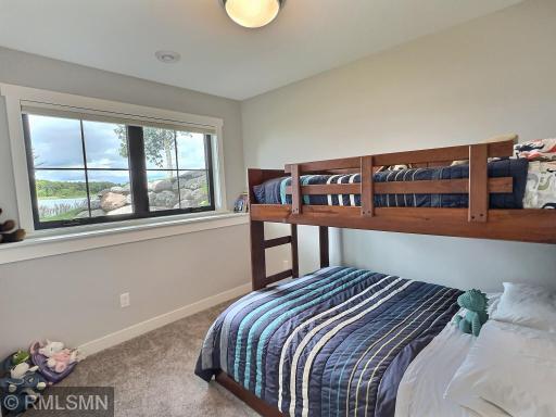 Also located in the lower level is the office features stunning Lake Sylvia views from a large window.