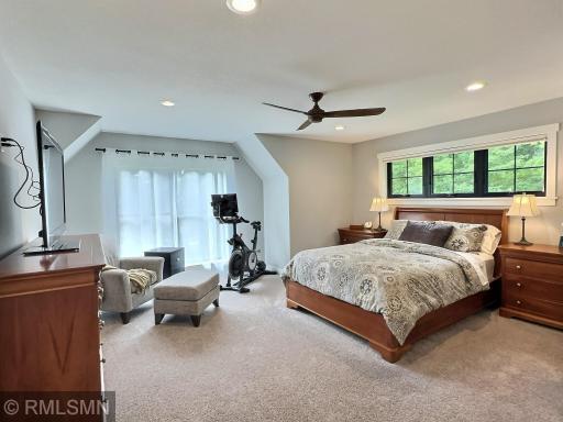 Spanning the entirety of the upper level, the spacious ownerâs suite offers privacy from the rest of the home.