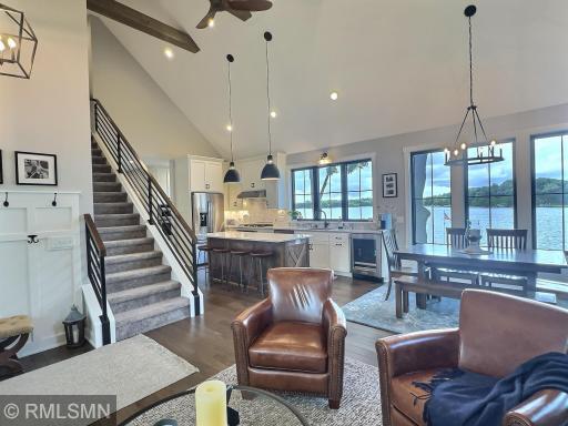 The warm high-end finishes are notable throughout the home and continue to the bright outdoor space.