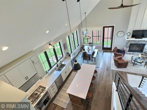 View of the main living area from the upper level, donât miss your chance to claim your own slice of lake heaven.