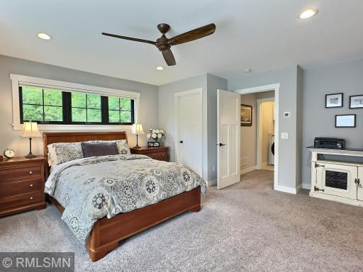 Relax and unwind, the owner's suite is finished with carpet, large windows, ceiling fan and soft muted colors.