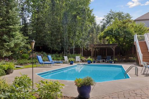 Imagine a hotel-like backyard, complete with lush landscaping and inviting spaces, all yours to enjoy!