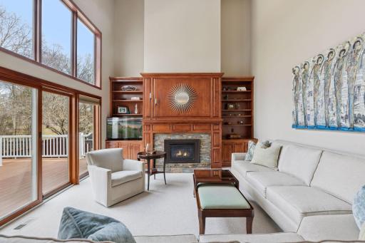 Another image capturing the vaulted family room's expansive height and abundant natural light!