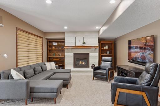 Experience movie night perfection in this cozy hearth room, complete with a beautifully refurbished fireplace!