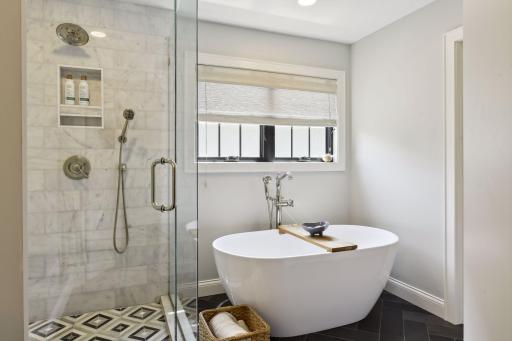 Marble shower, separate wand and shower head, freestanding soaker tub