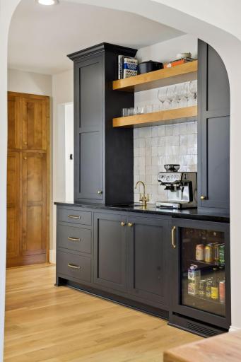 Built in pantry, coffee bar, beverage fridge and sink