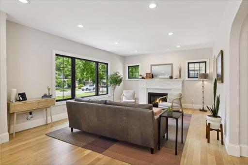 Bright and sunny living room with gas fireplace
