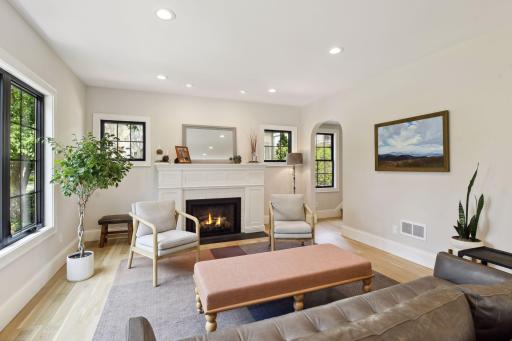 Bright and sunny living room with gas fireplace