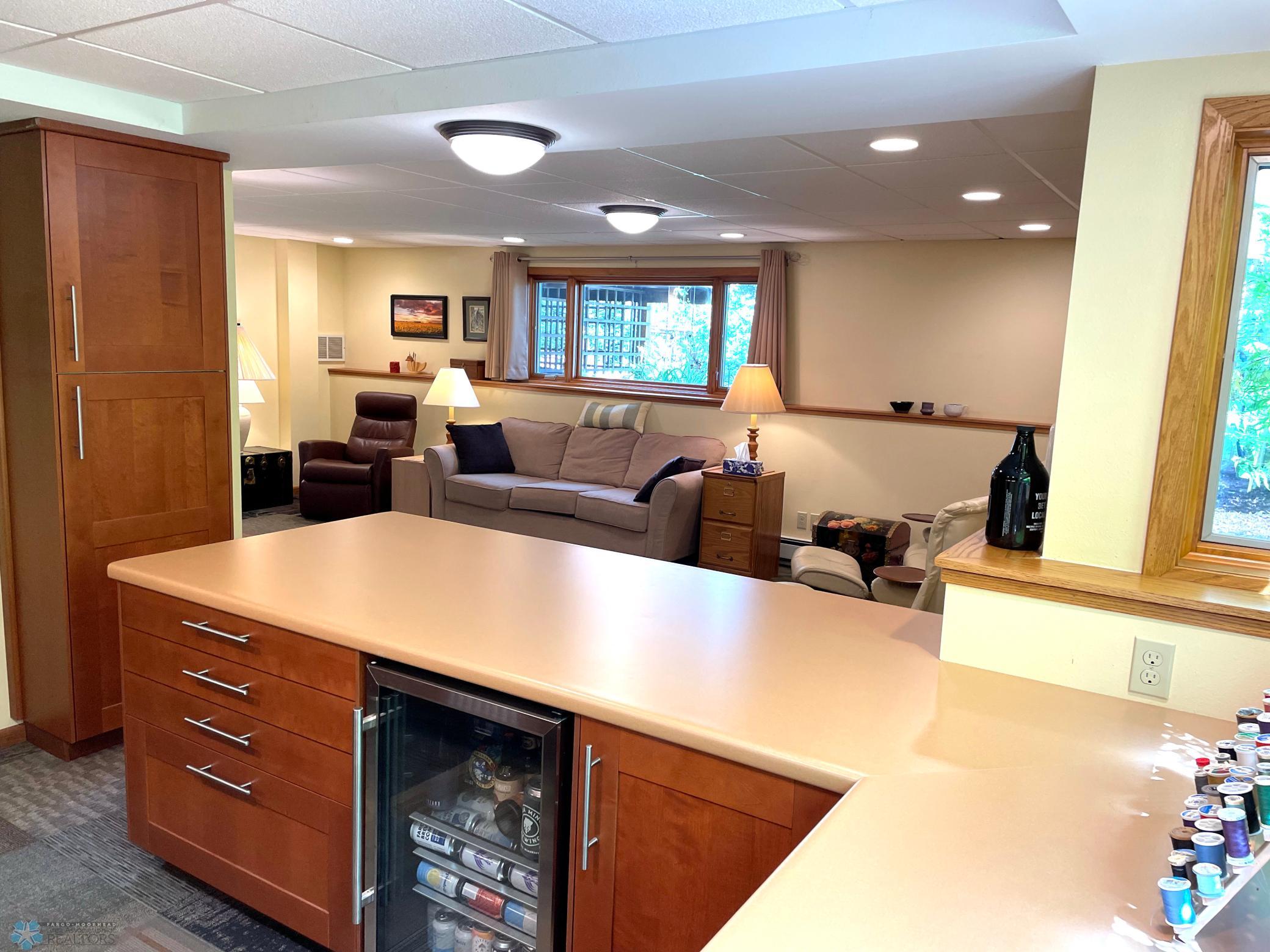Hobby area : kitchenette on lower level - Beverage refrigerator is included.jpg