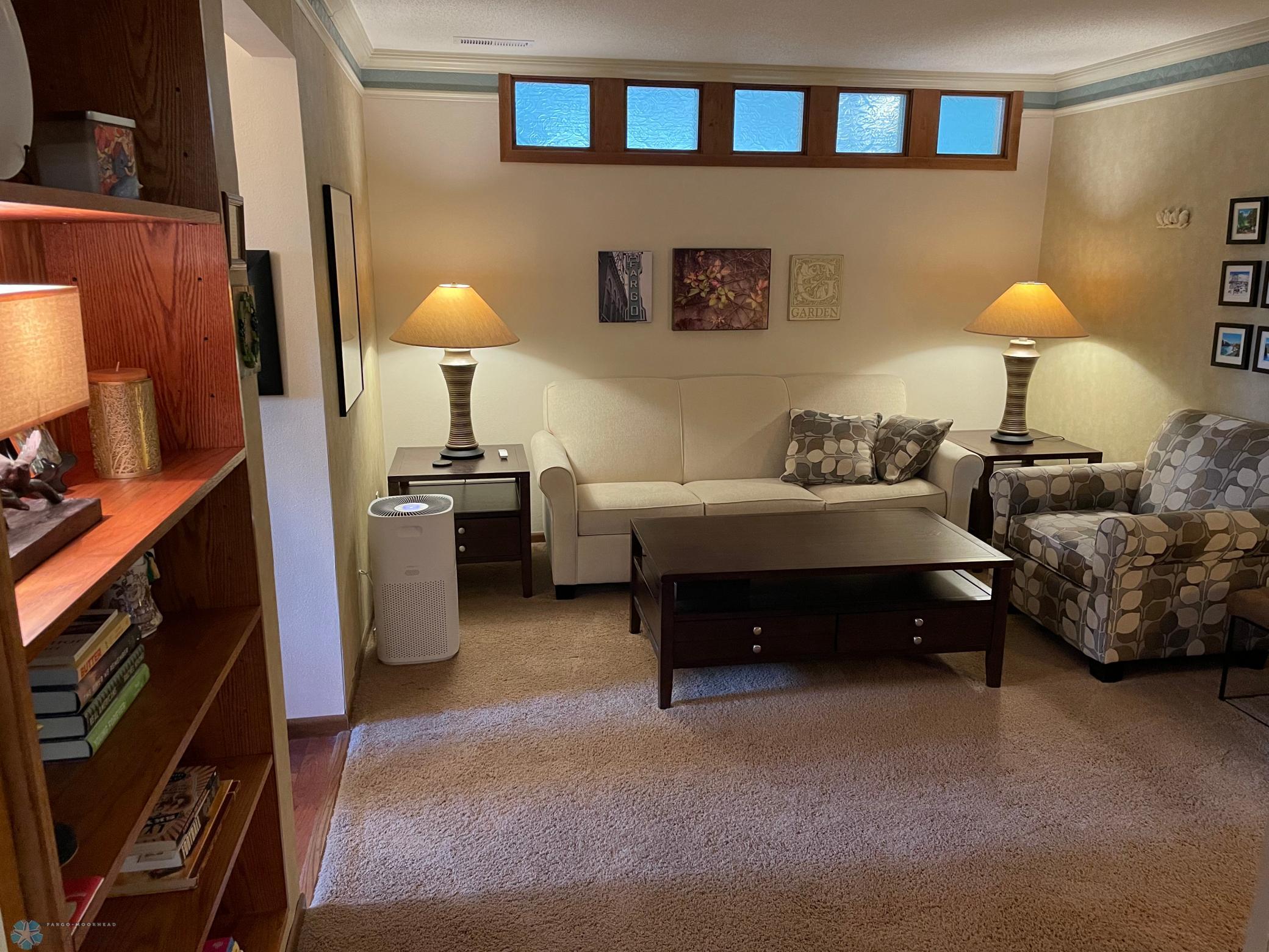 Upper level family room : den with gas fireplace.jpg