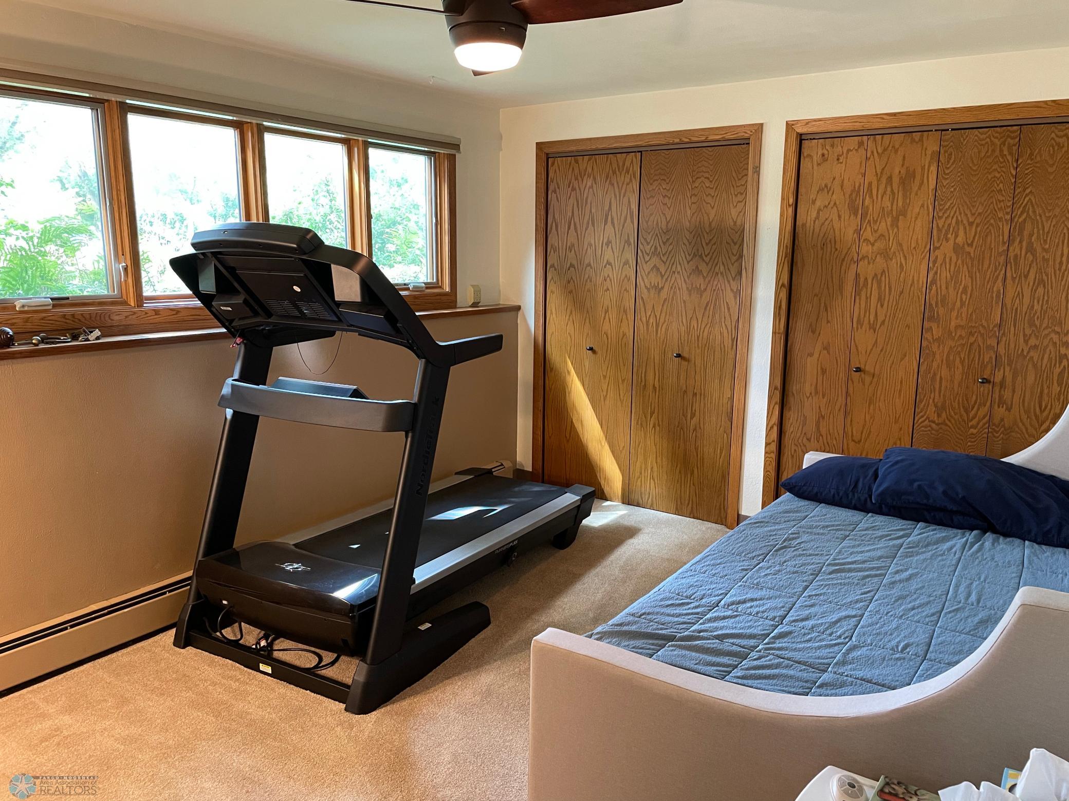 Bedroom 2 with full wall of closets.jpg