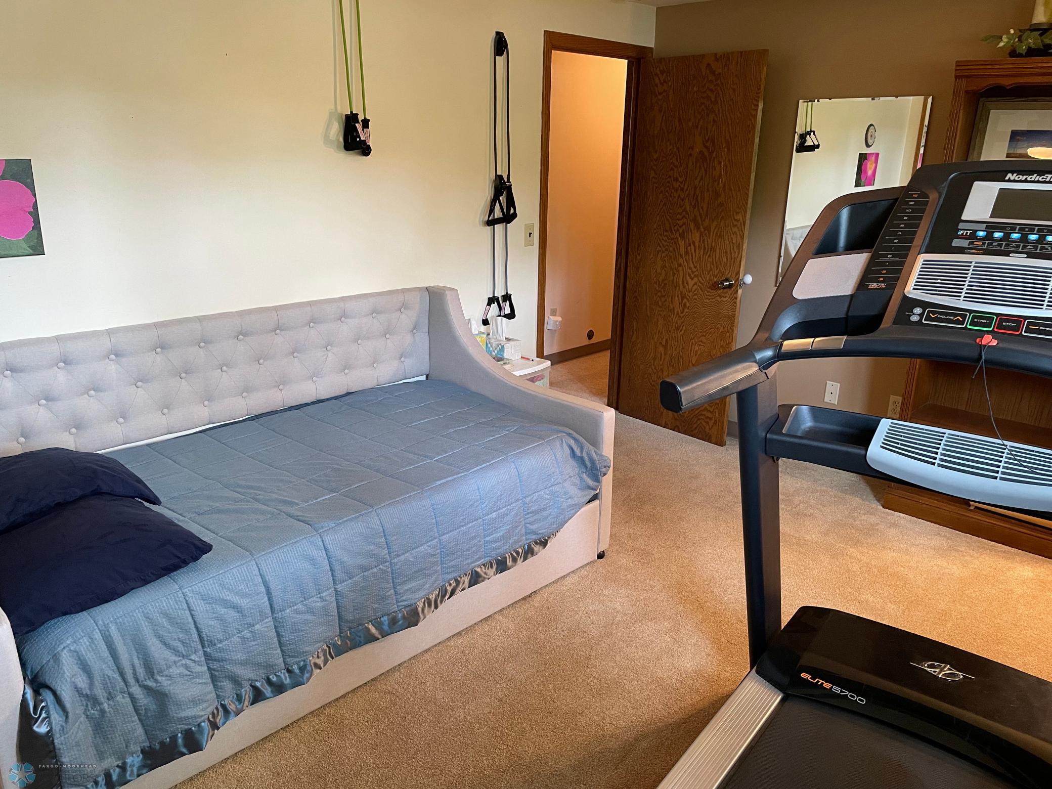 Bedroom 2 with full wall of closets - reverse view.jpg