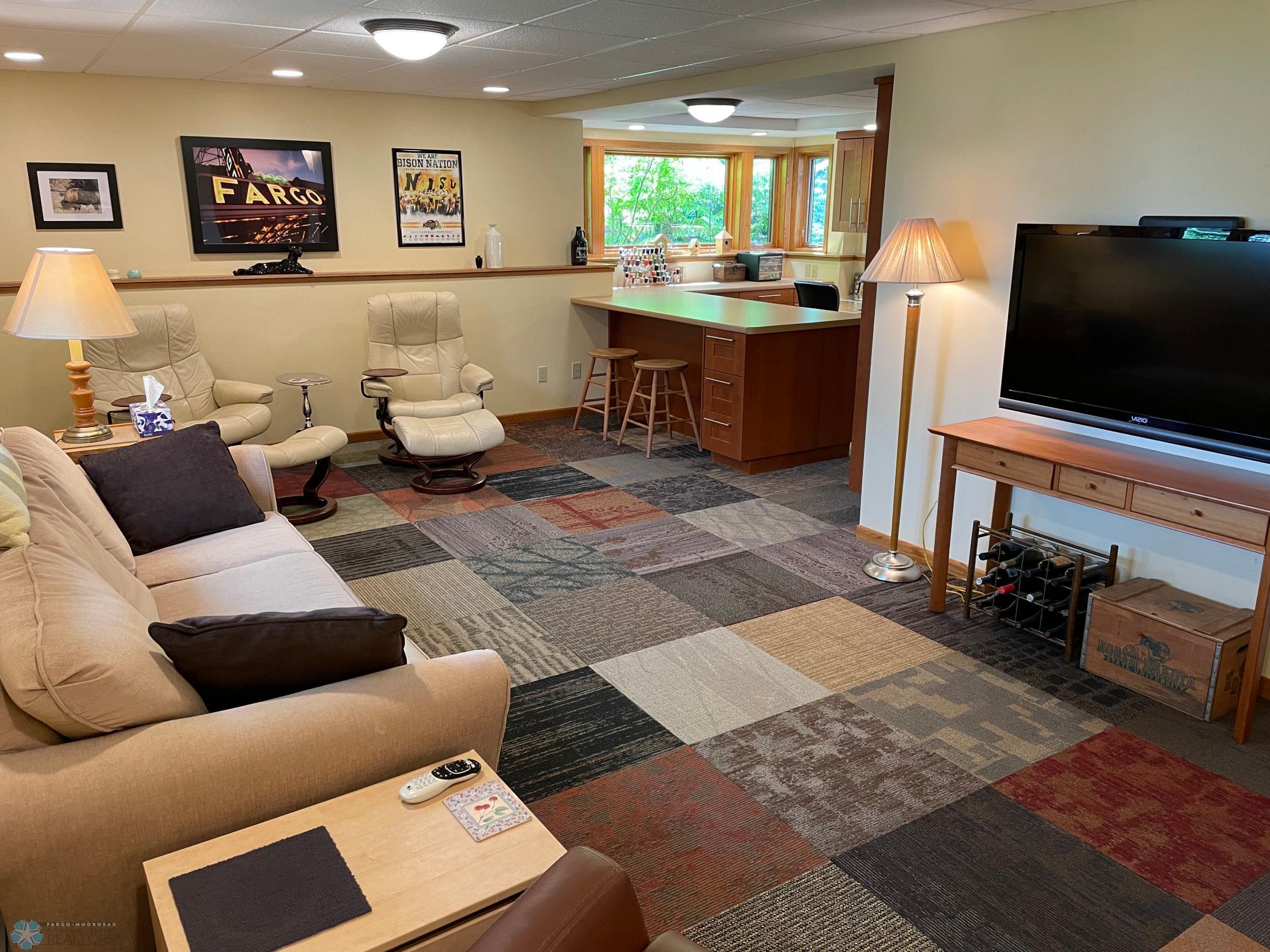 Family room on lower level - view to the hobby area:kitchenette.jpg