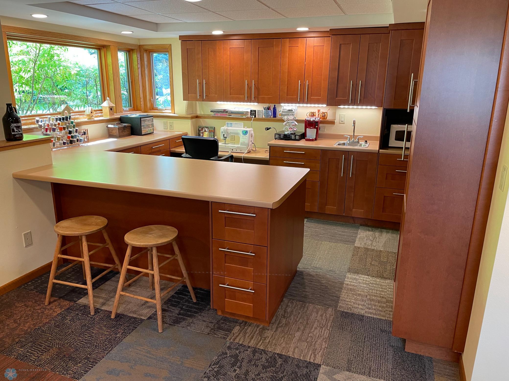 Hobby area : kitchenette on lower level - view from family room.jpg