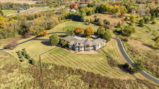 Introducing 4550 and 4570 Wolverton Place in the beautiful Foxfyre Estates neighborhood of Orono, Minnesota. Nestled on ten sprawling acres, this executive rambler boasts six bedrooms and eight bathrooms across 7,869 finished square feet.