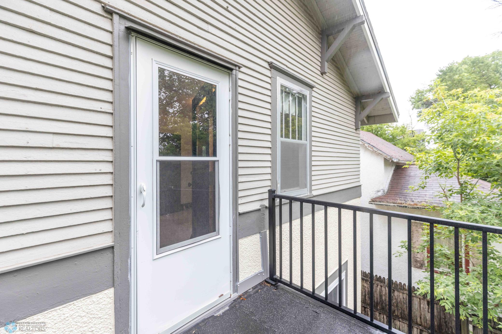 Balcony door from primary bedroom