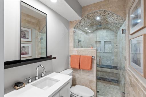 Second bath on the main level with oversized shower with rain shower head
