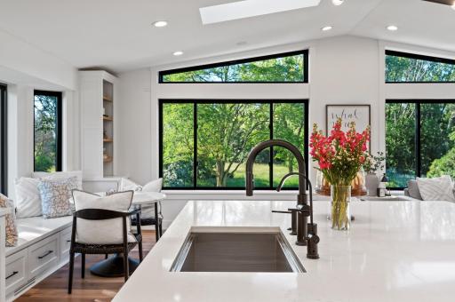 Eagle Lake Park Reserve is across the channel offer unparalleled privacy and the most perfect backdrop for this stunning home.