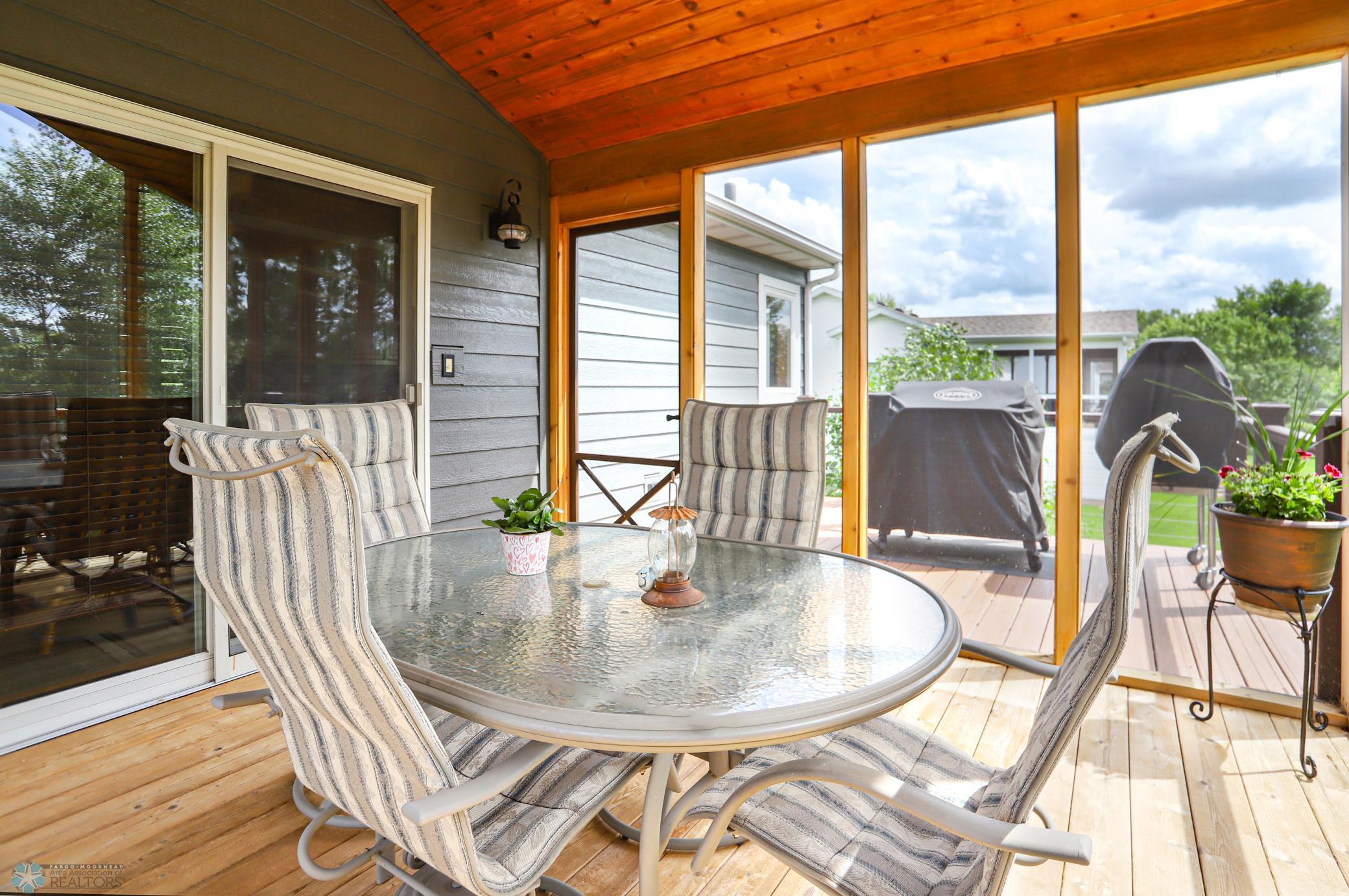 Screened In Porch attached to maintenance free deck
