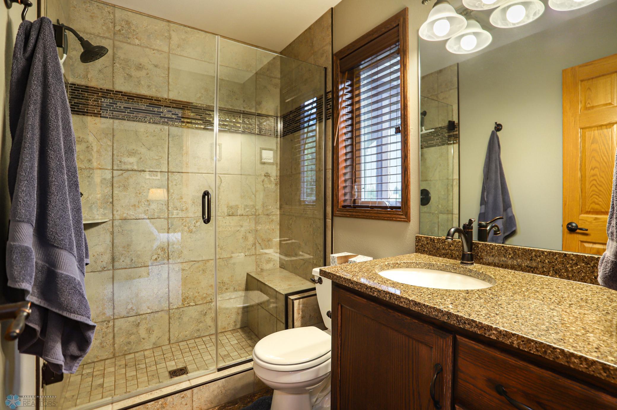 Primary Bedroom En Suite with tile shower