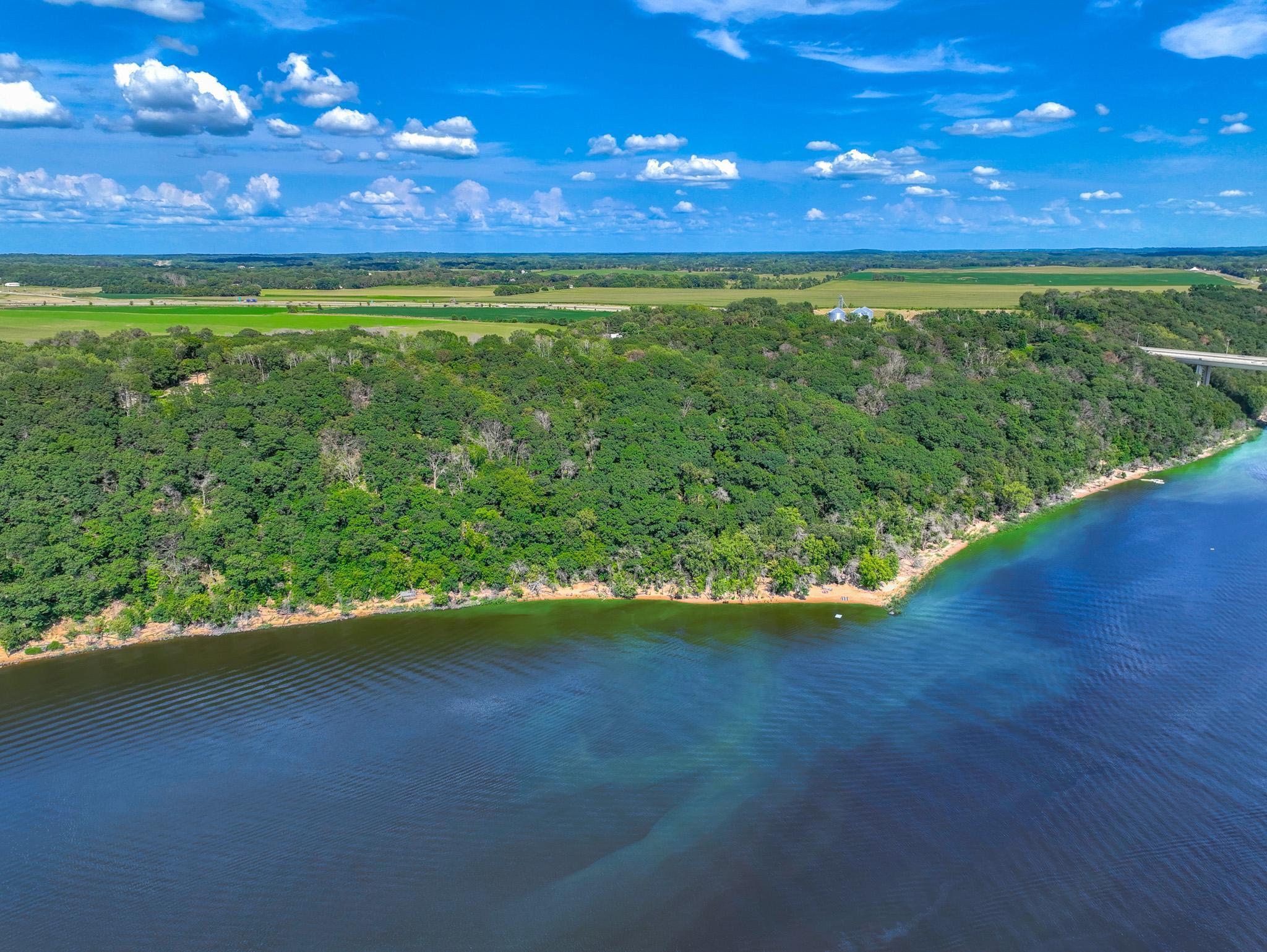 This parcel extends to approx. 100' of the dock shown on the far right (before the bridge), it also extends about halfway to the left.