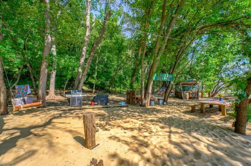 If this were a house, we would call this your Great Room...eating area, cooking station, stop by the bar to make a drink, relax in the swing... just a GREAT area to congregate!