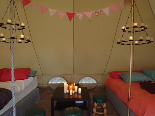Current owners are "Glampers" and enjoy a good nights sleep, they keep a generator behind the tent to keep laptops charged. Of course....memory foam king size mattresses for parents & kiddos