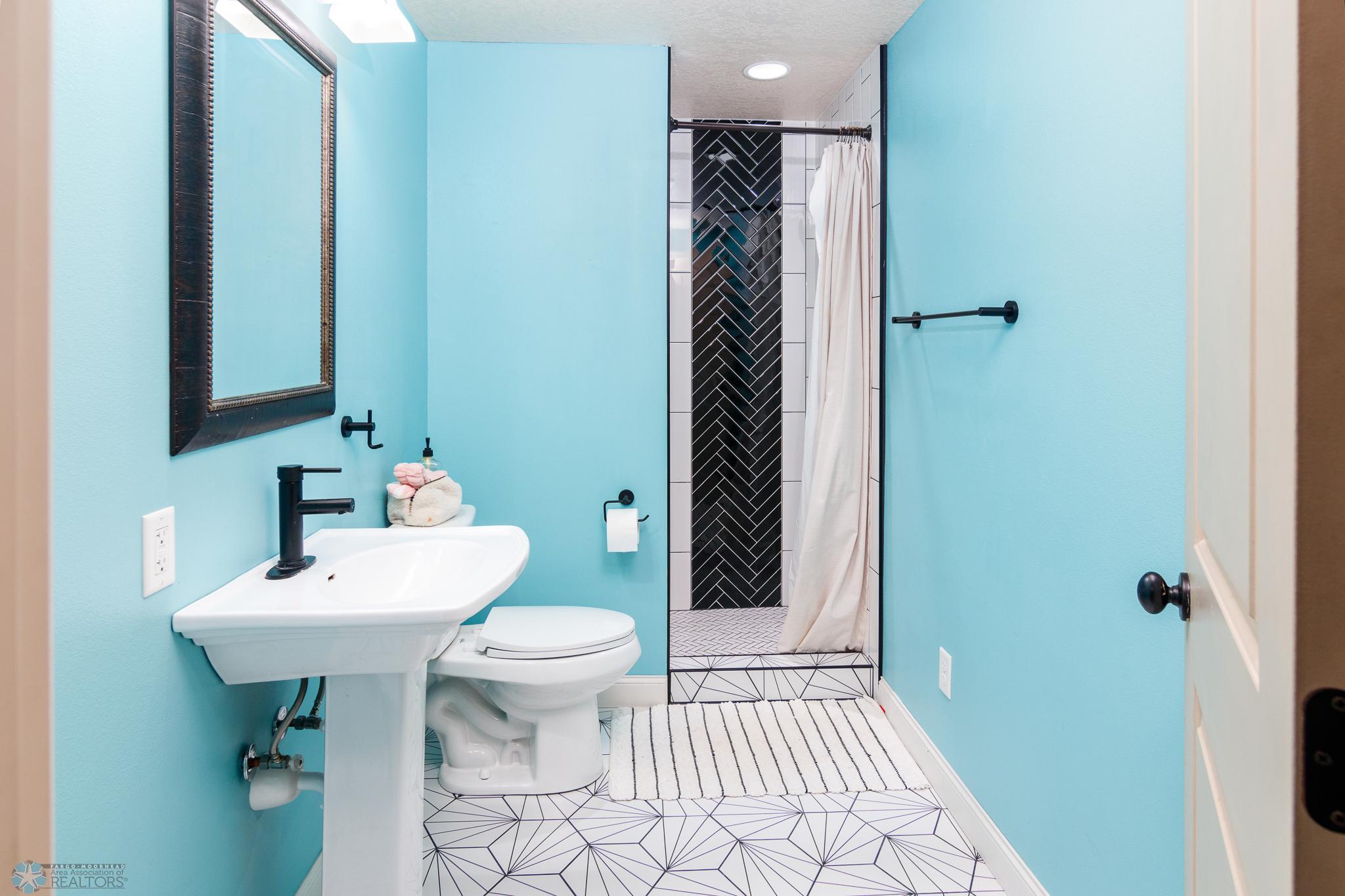Basement Bathroom - Tiler Floor