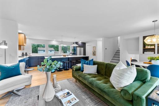 This incredible space seamlessly flows into the living and dining area.