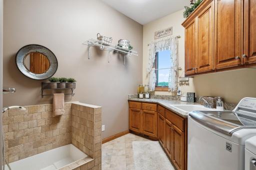 This Main Level Laundry also has Granite Countertops, Lots of Cabinet Space and Oversized LG Washer and Dryer, Great for King Sized Bedding and Sleeping Bags. More Info on Appliances and Mechanical Systems are in Your Home Tour Supplement.