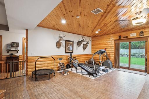 This is Such a Big Space There's Plenty of Room for Workout Equipment, too. Or Go Outside to the Fenced Back Yard to Exercise, Relax or Entertain. Note the Porcelain Tile Flooring Here and in the Full Bath, with More Plush Carpeting in the Bedrooms.
