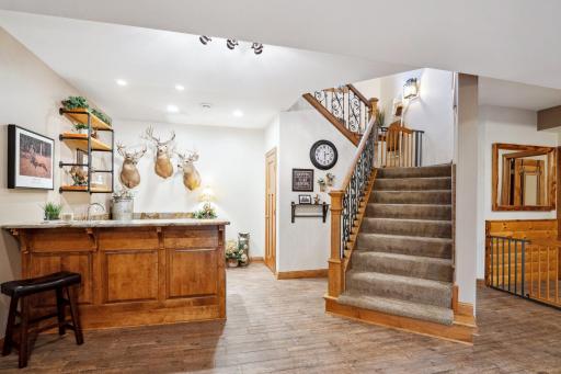 Just Down from the Entry Follow the Beautiful Open Staircase to the Walkout Lower Level. Pull Up a Stool and Tell Some Stories!