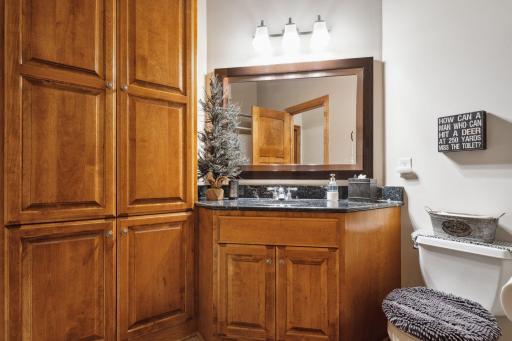 Main Level Second Full Bath with an Incredible Linen Closet.