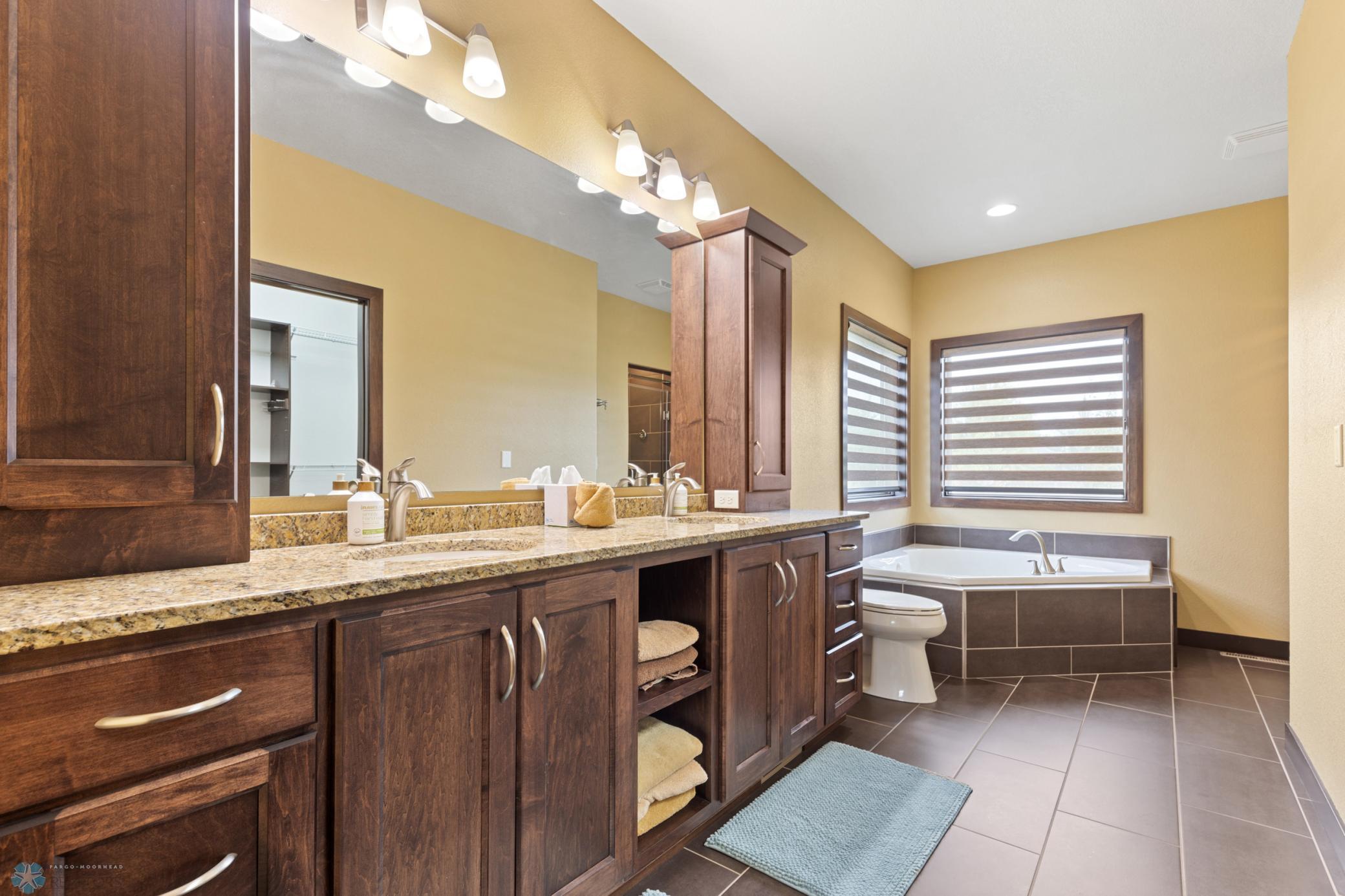 primary bath, double sinks, steam shower, jetted tub, floor heat