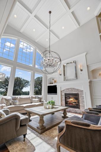 Dramatic two-story wood paneled coffered ceiling