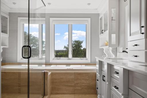 Separate room for toilet with pocket door access. Crown molding throughout