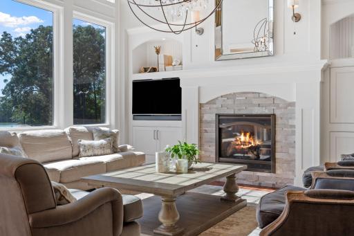 Gas fireplace w/ stone and enameled surround