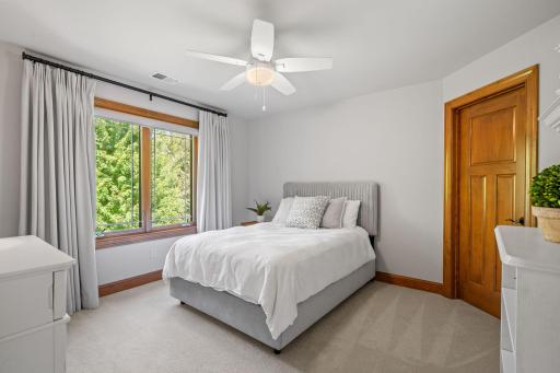 Bedroom 4 features walk-in closet with custom storage organizer