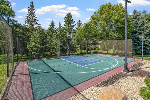 Sport court offers variety of play and is adjacent to the pool area