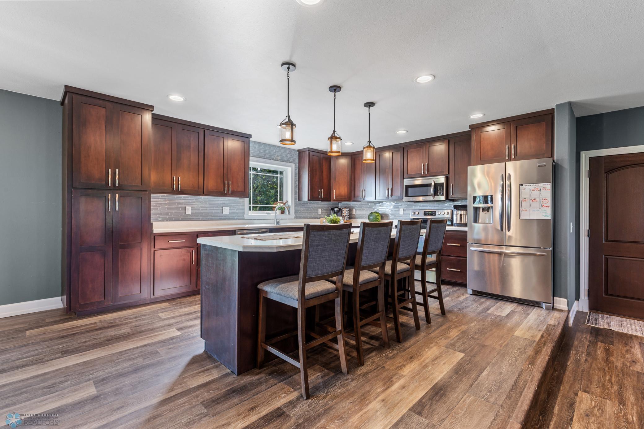 Kitchen featuring stainless steel appliances and plenty of storage!