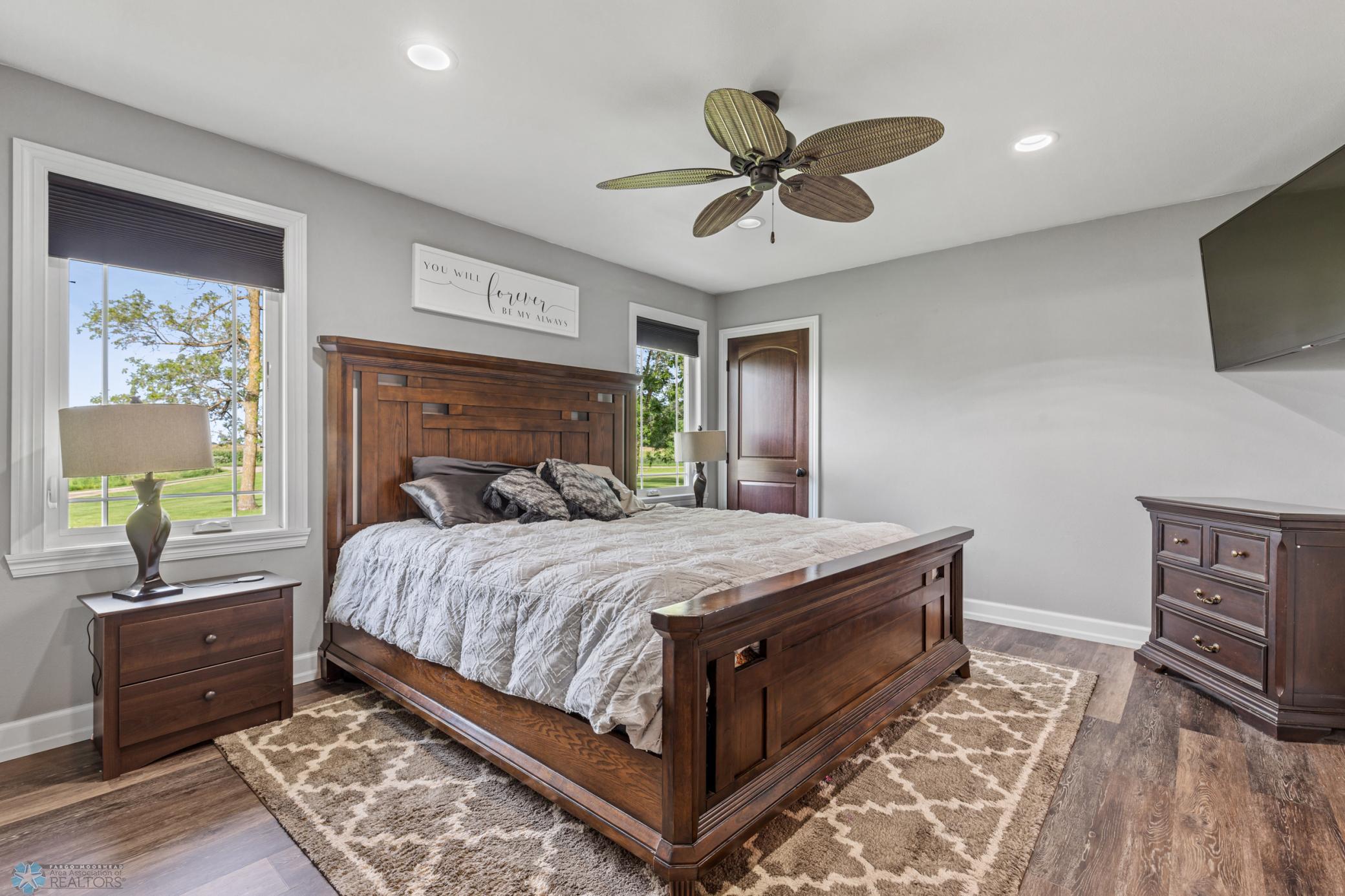 Primary Bedroom with two closets including one walk-in and private ensuite bath