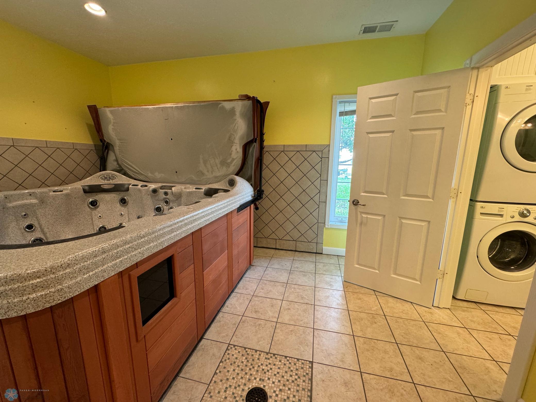 Hot Tub room - has it's own 3/4 bath & Laundry!