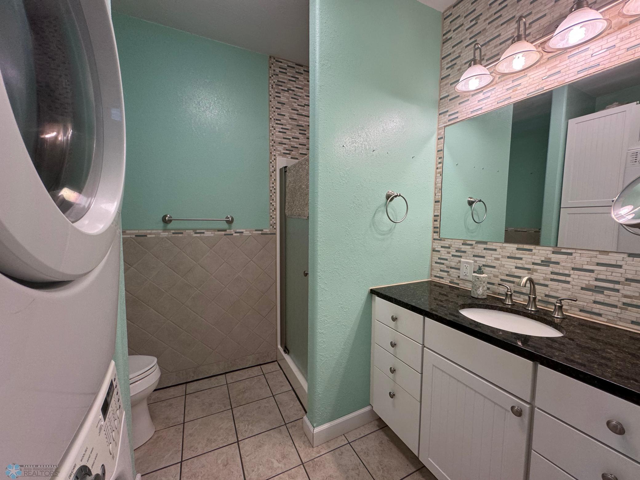 3/4 Bath (with shower) just off the hot tub/workout room