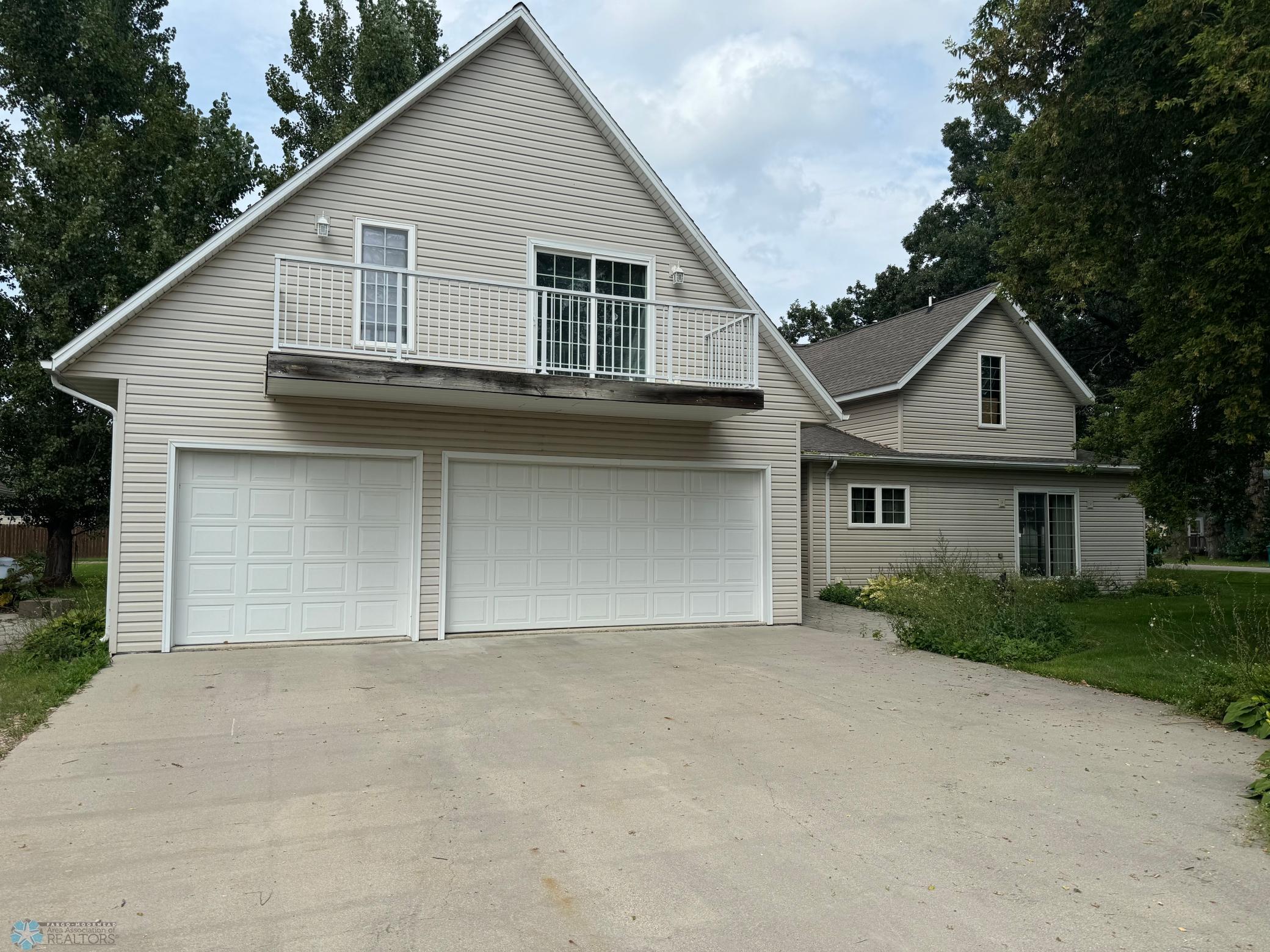 Fixer Upper Opportunity in Kindred, ND - 4 bedroom, 3 bath, 3stall heated (floor heat) garage w/second kitchen and family room above garage.