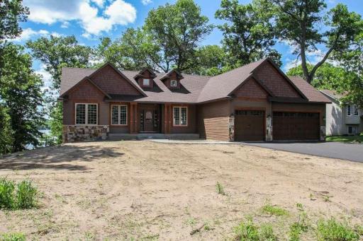 FRONT : ALL PHOTOS ARE OF A SIMILAR HOME BUILT AT ANOTHER LOCATION.