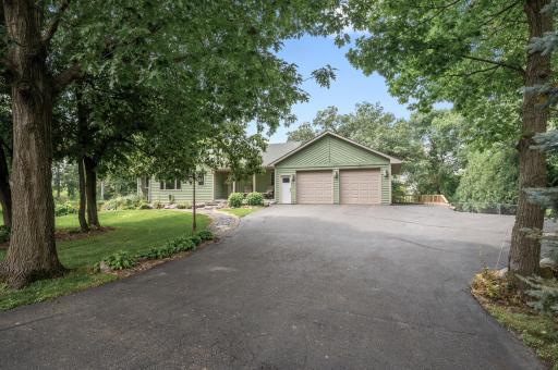 Welcome to 8203 Cty Rd 13. This gem is tucked back off the road, nestled in a tranquil wooded setting.