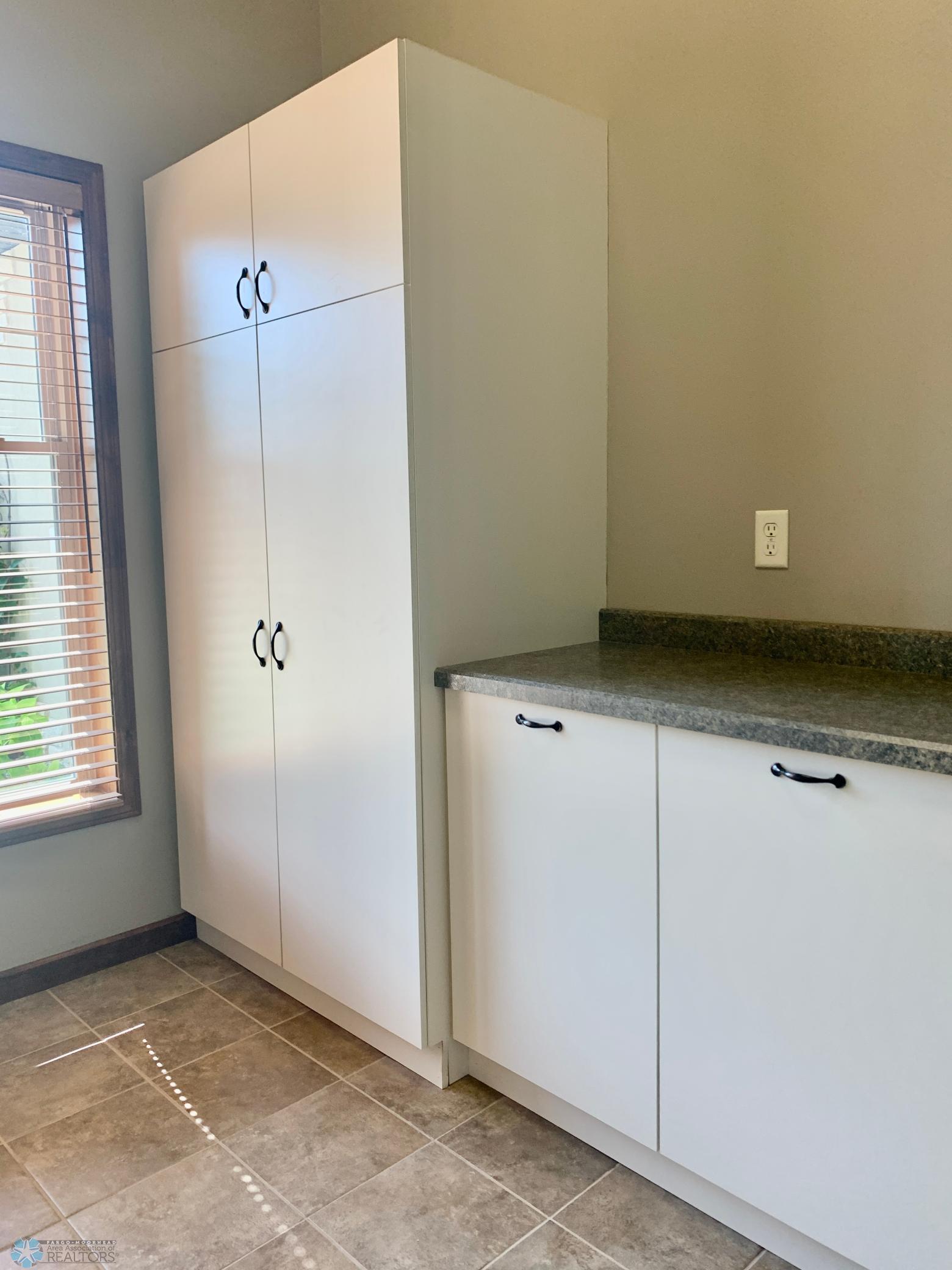 Laundry storage and folding counter