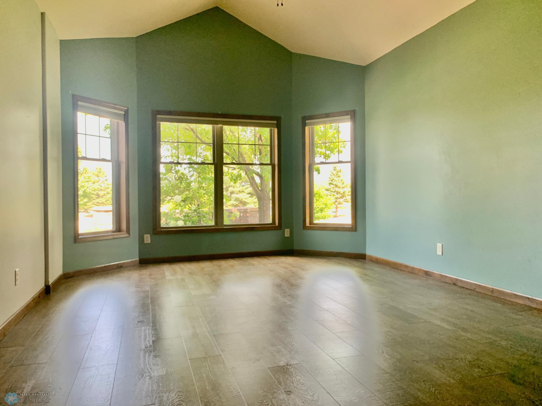 Very large primary suite facing the pond